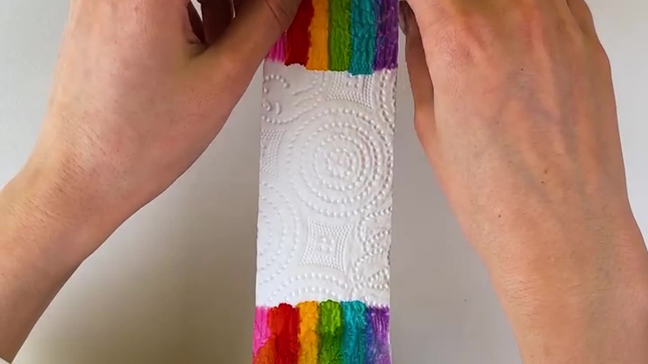 Paper towel turns into rainbow magic.hd