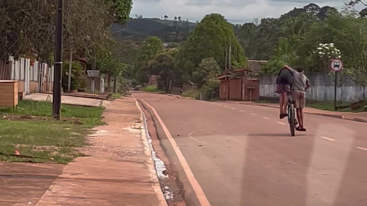 Kids Have a Unique Way of Riding Tandem