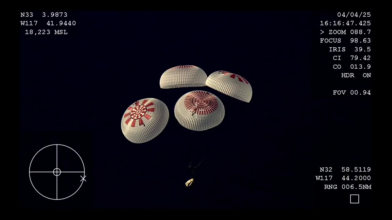 SpaceX Dragon’s four main parachutes have deployed