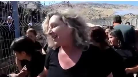 Emotional Reunion: A woman from Majdal Shams, Israel, embraces her sister in Syria