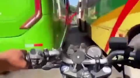 Biker ripping through traffic