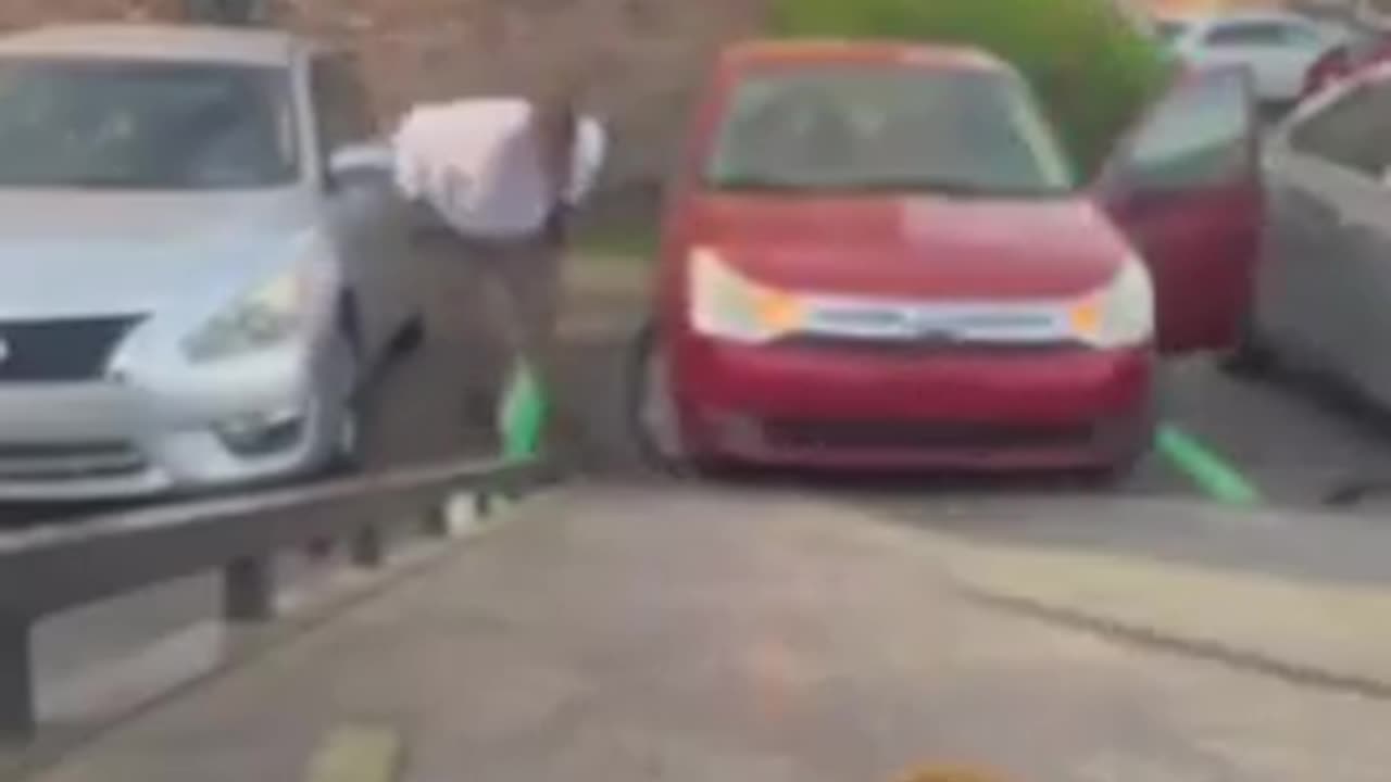 Negro runs over repo man's head with car