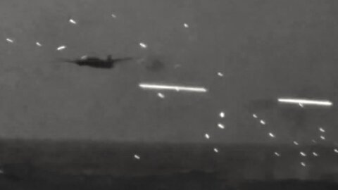 Essex-class carrier under attack by Japanese G4M "Betty" torpedo bombers and kamikaze aircraft