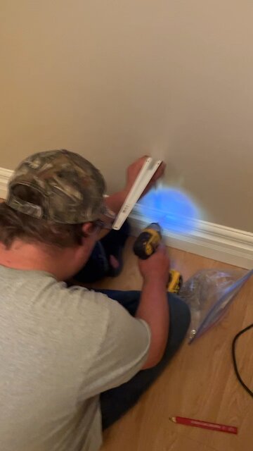 tim working on his room