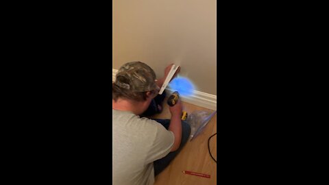 tim working on his room