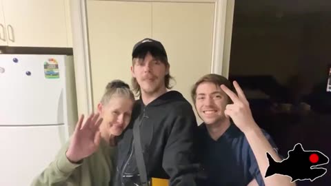 Posing with Slack's mom after they got home | fish shack