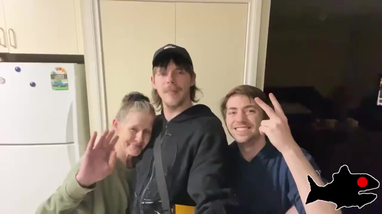 Posing with Slack's mom after they got home | fish shack