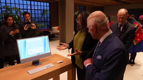 King Size Fingers Charles Tours Apple's New UK Headquarters With CEO Tim Cook
