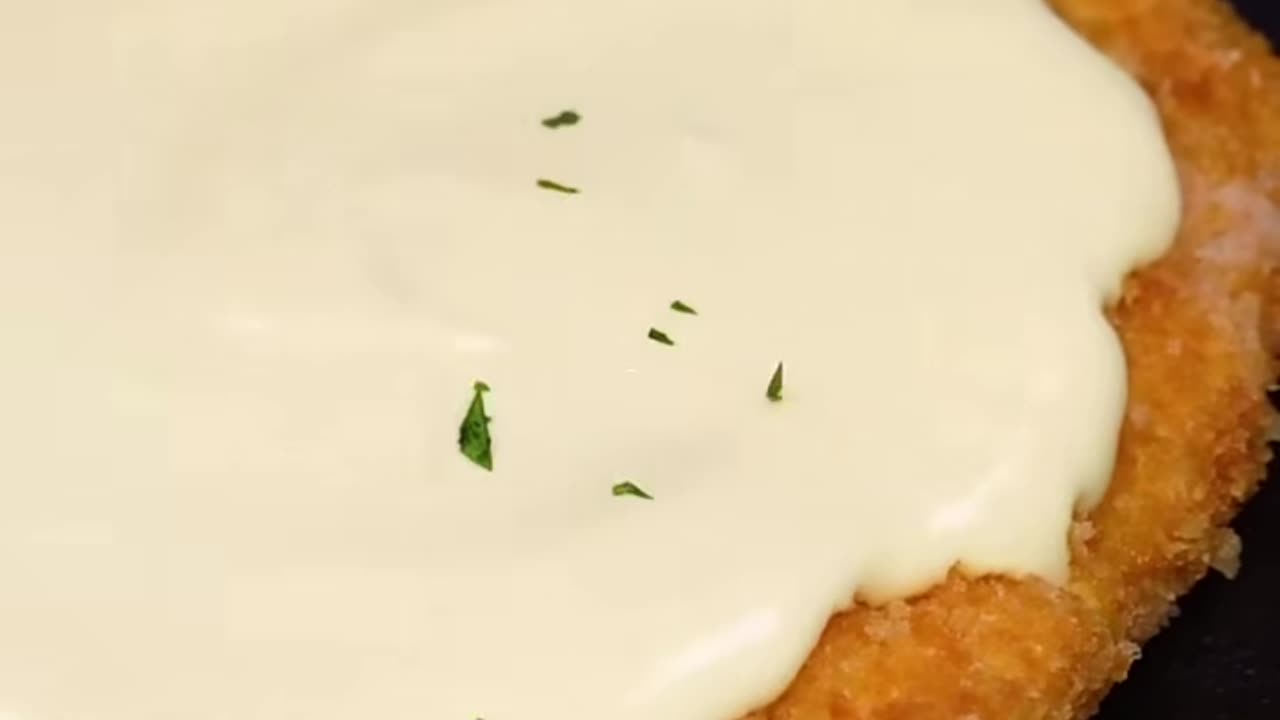 Crispy Chicken steak with creamy cheese sauce