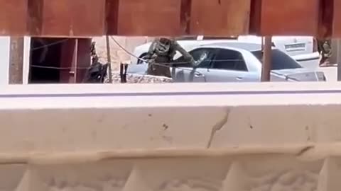 “Israeli occupation forces smash the windshields of parked vehicles during a raid on the village of Al-Tabaqa, south of Hebron, the occupied West Bank.”