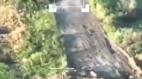 😮 Ukrainian hexacopter drops spikes on the road to counter Russian soldiers on motorcycles.
