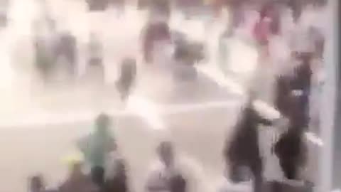 Massive crowds have stormed Dar es Salaam International Airport in Tanzania