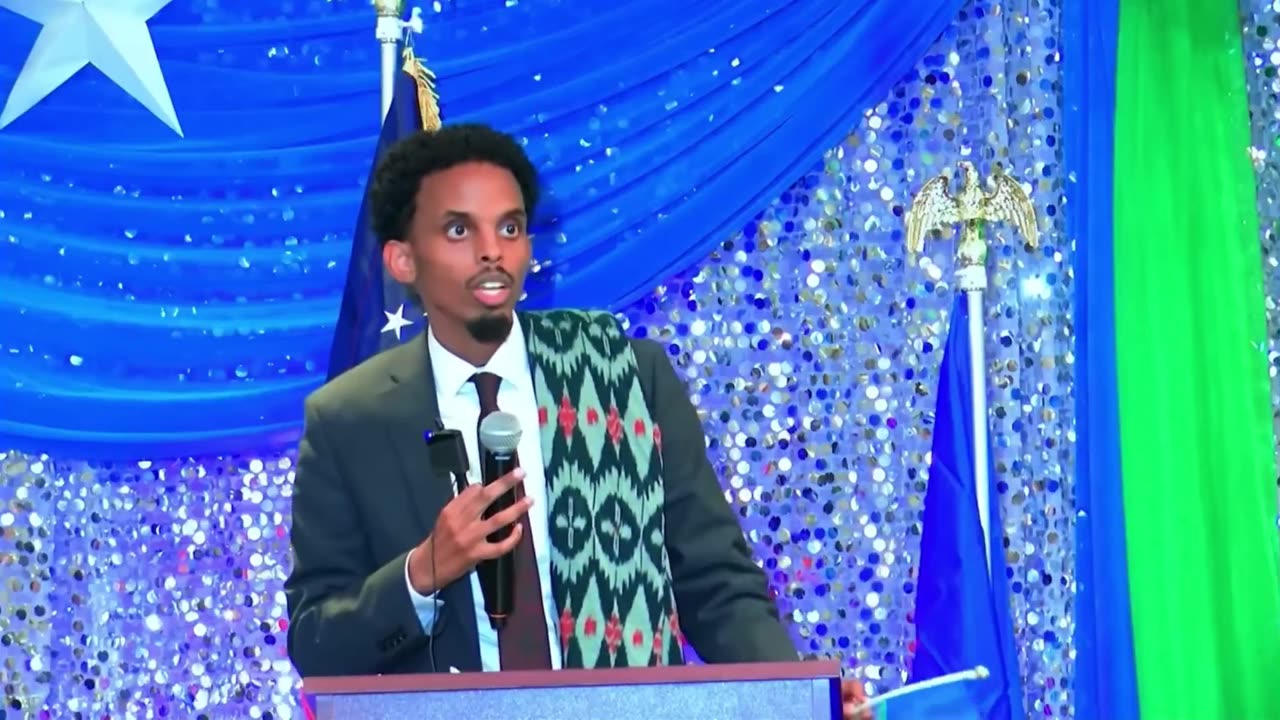 At a rally in Minneapolis, Omar Fateh waved a foreign flag, spoke in a foreign language,