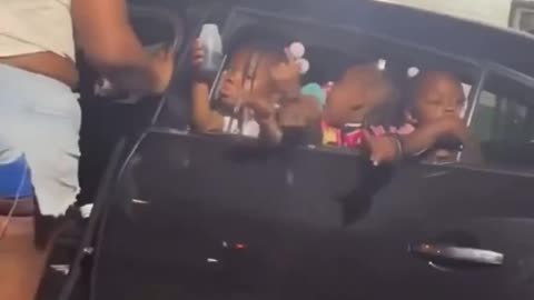 Black toddlers throwing up gang signs and middle finger......