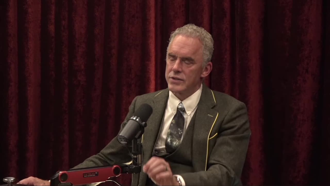 Peterson bites Andrew Tate