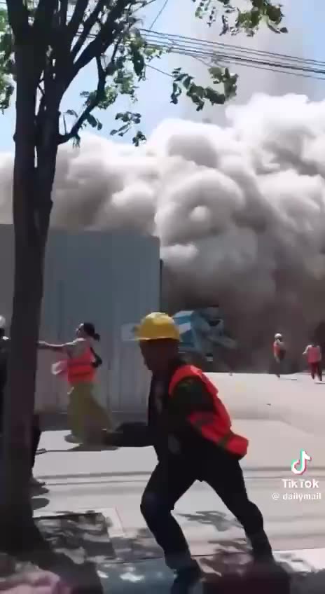 7.7 magnitude earthquake destroys Bangkok apartments