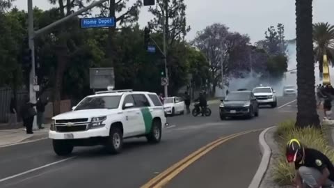 Los Angeles protester throws large rocks at ICE cars as officials arrest locals in Paramount
