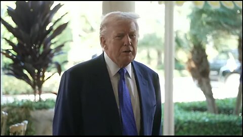 TRUMP SPEAKS TO REPORTERS AT WEDDING