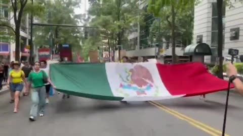 WATCH: An enormous Mexican flag was unfurled and paraded through the streets of Charlotte