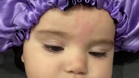 Baby in a Satin Cap