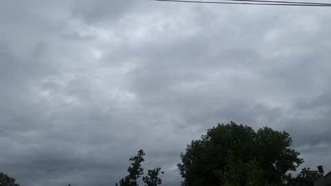 The "clouds" blocking the direct light from the white sun(blue hue) and the yellow sun