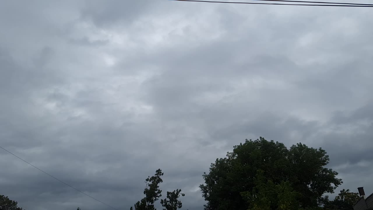 The "clouds" blocking the direct light from the white sun(blue hue) and the yellow sun