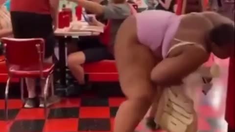 fat woman twerks in front of man and his family