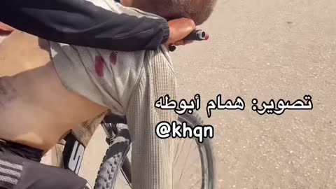 Heartbreaking: A Palestinian youth carries his father’s body, shot by an Israeli sniper, in Rafah.