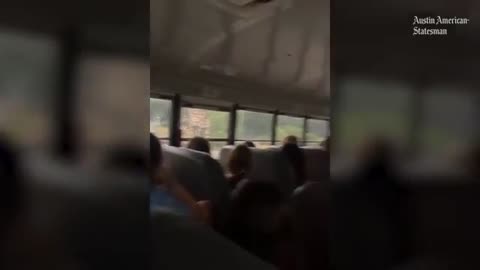 survivors sing songs of worship during evacuation while passing scenes of Texas flooding damage