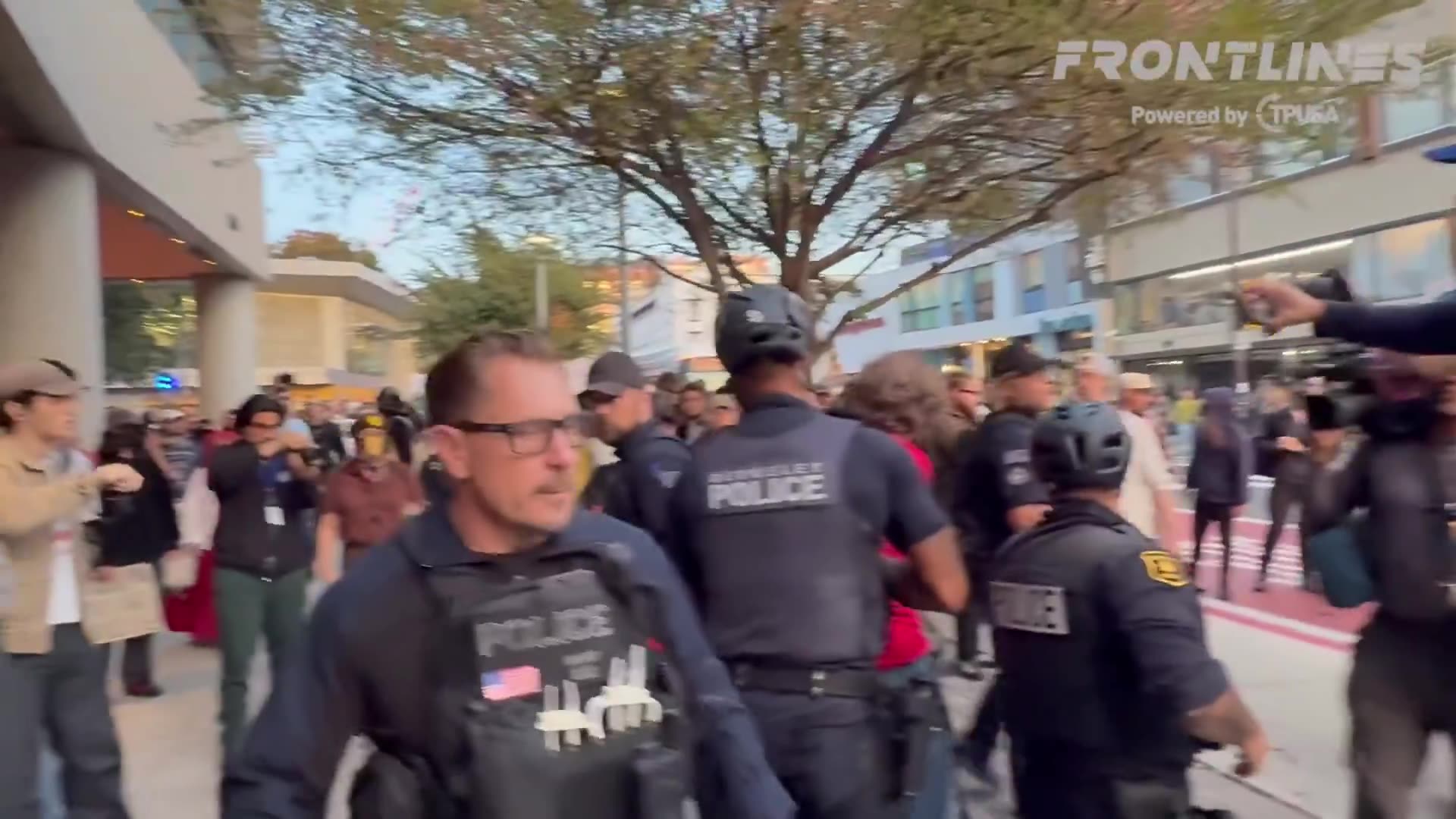 A fight broke out near a Turning Point USA event at UC Berkeley in California during a protest.
