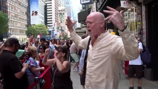 Protesters rally as CBS cancels Colbert’s 'Late Show'