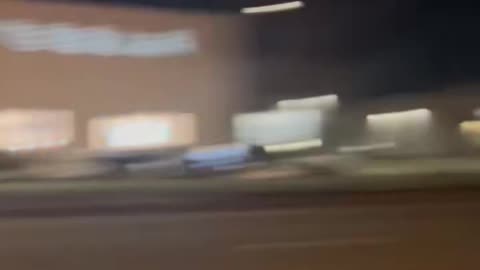 Woman was spotted wearing black running away after a fire was set in front of a