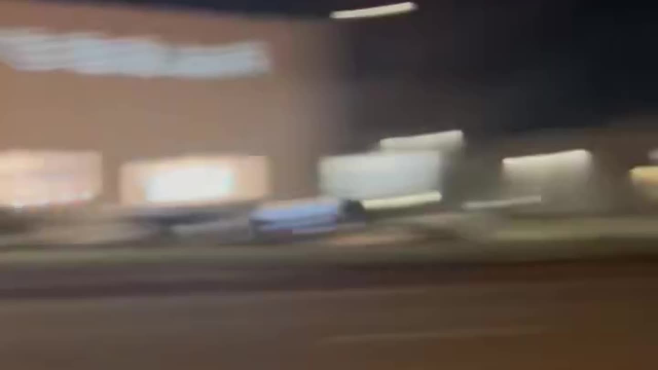 Woman was spotted wearing black running away after a fire was set in front of a