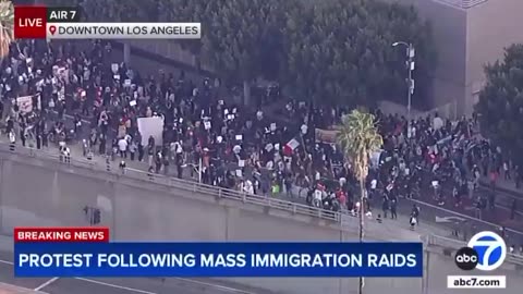 Protesters surround federal detention center in Los Angeles, California as ICE raids continue.