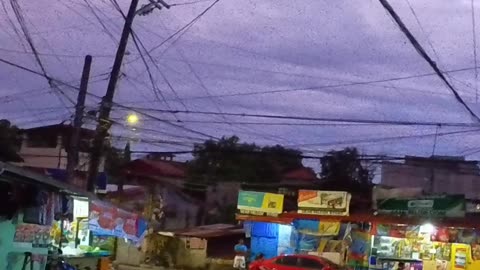 7pm on Santa Monica Street in Commonwealth, Quezon City, Philippines