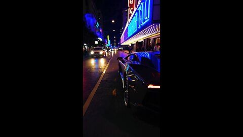 Lamborghini Riding through the city lights