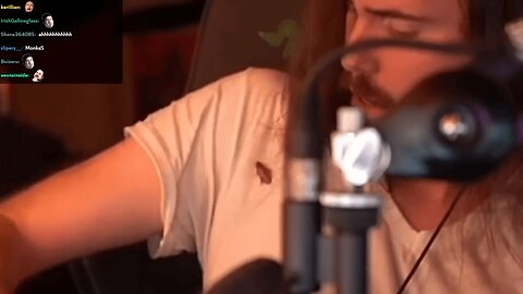 Asmongold Grabs a Roach Off His Shirt