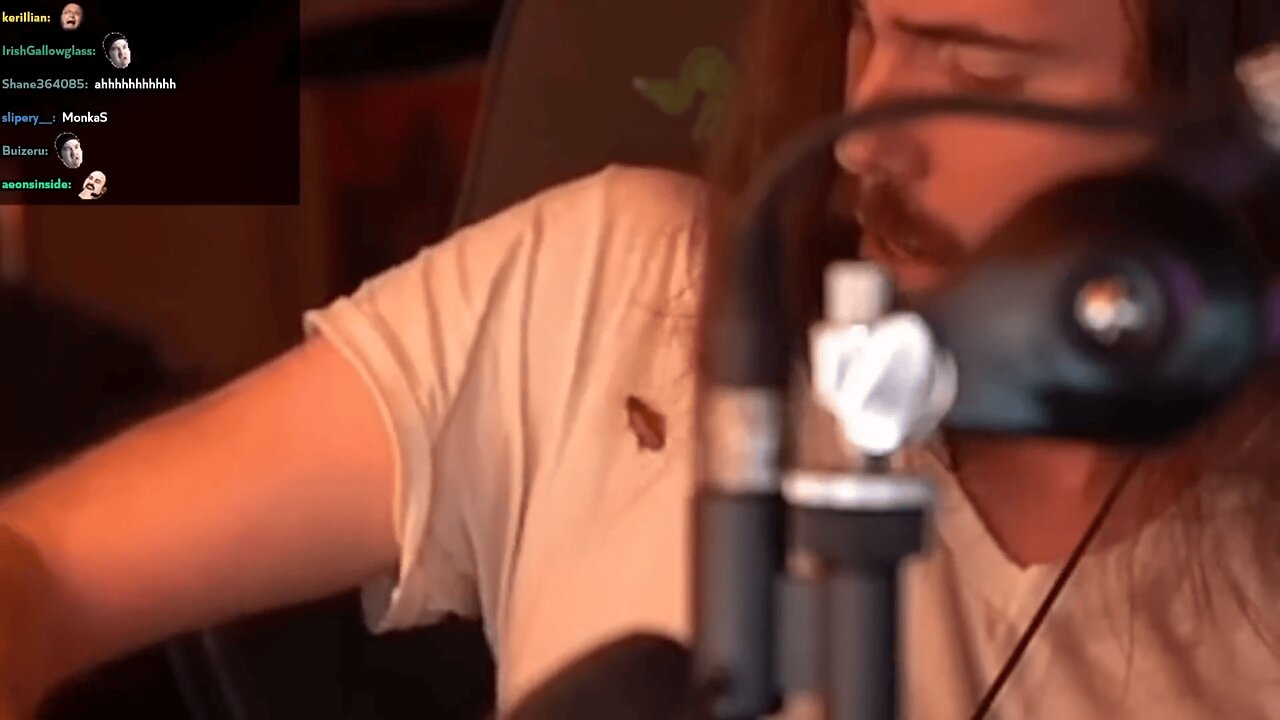 Asmongold Grabs a Roach Off His Shirt