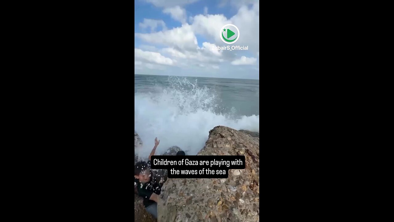 Children of Gaza are playing with the waves of the sea.