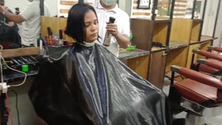 woman shaved her head with razor