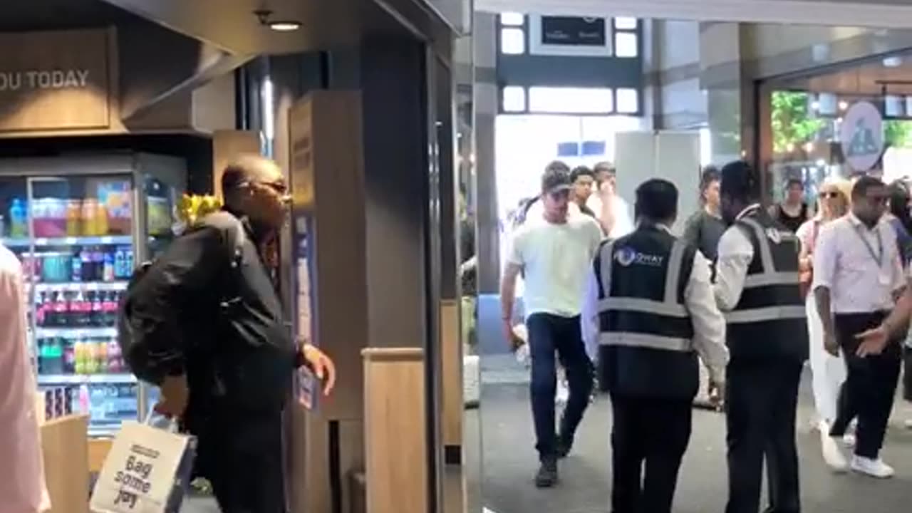 The tide turns against the shoplifter at Greggs on Hammersmith Broadway, London.