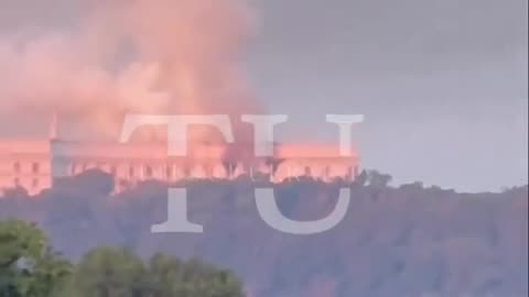 Kiev. From the Russian attack on the government, the building is seen on fire.