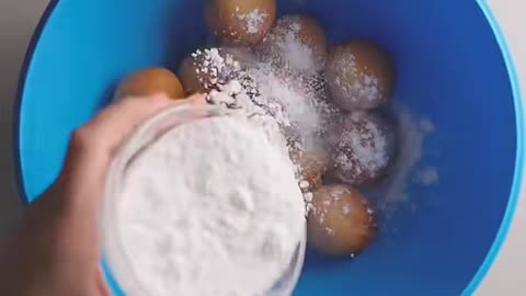 Lets make a round donut with sugar coat with chocolate sauce