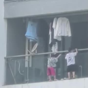 Terror at the Top: Two Children Rescued from the 13th Floor in China