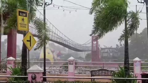 Typhoon Fung-wong shake a suspension bridge in Camaligan, Camarines Sur, Philippine