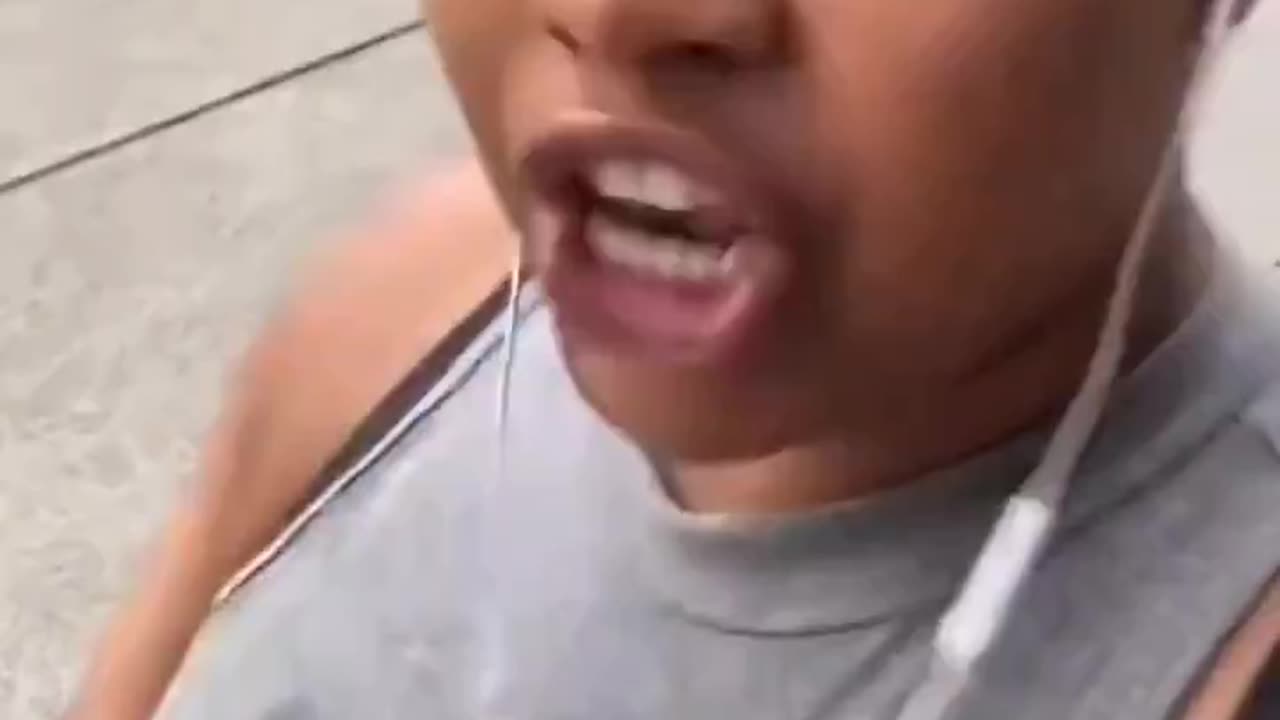 If you're white, she won't move from the street and will run over you to knock you down.