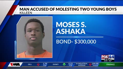 Blakc man accused of molesting two young boys