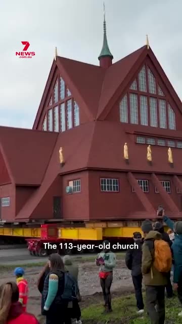 Historic Swedish church moved 5km on giant trailer to new home