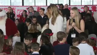 First Lady Melania Trump Happily Takes Selfies With Children At Toys For Tots Event
