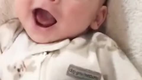 funny baby playing